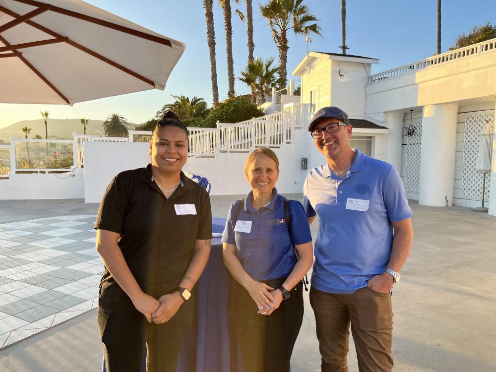 Alexei Rudolf and Maria Perez visit with Leisy Torres of Miguel’s Jr. 