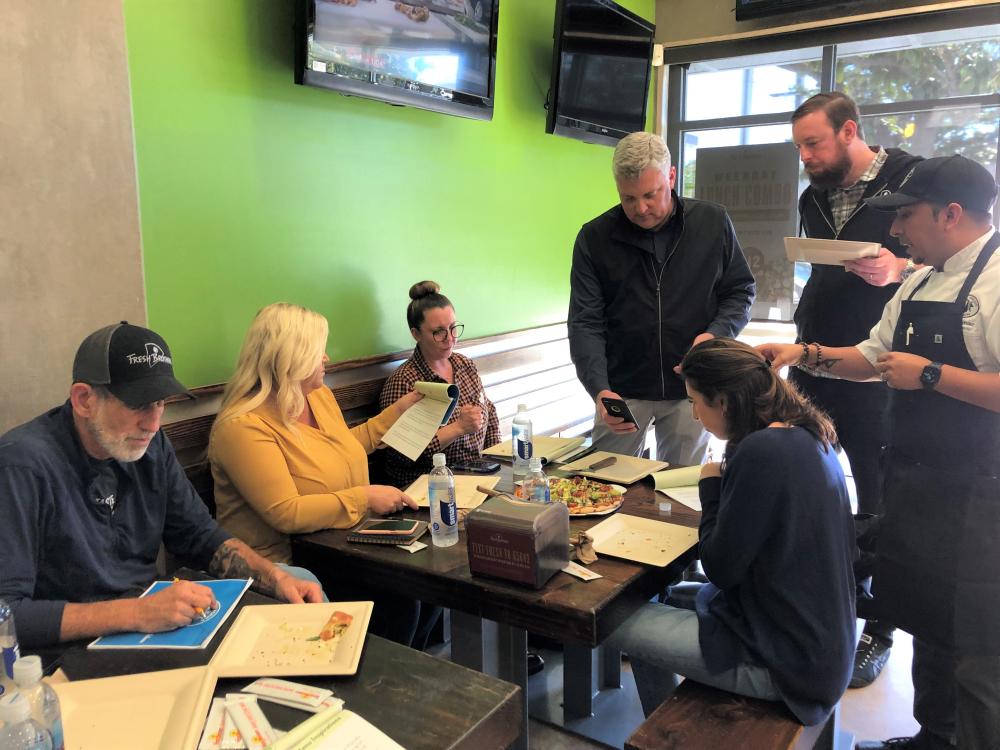 Chef Hernandez describing a California avocado pizza concept and how he incorporated Fresh Brothers’ ingredients into the recipe.