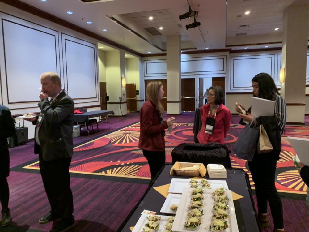 Kim Kurata and representatives from Cal Poly Corporation (Cal Poly’s campus dining program) discuss the seasonality of California avocados.