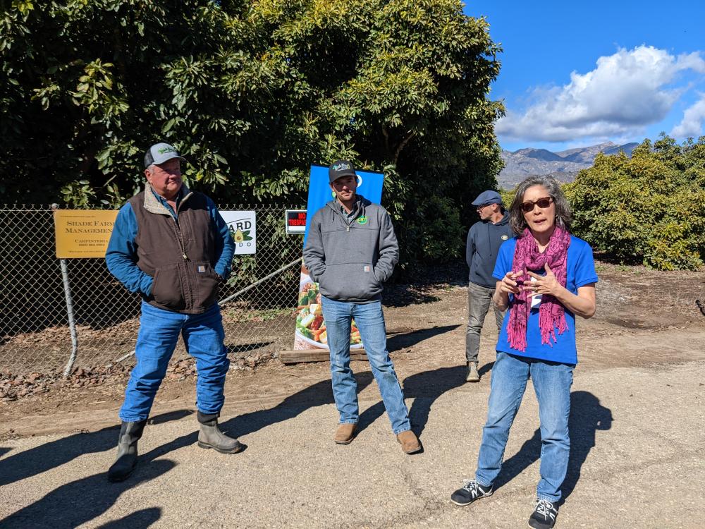 Rick and CJ Shade, of Share Farm Management, join Alexei Rudolf and Kim Kurata as they greet attendees touring a California avocado grove.