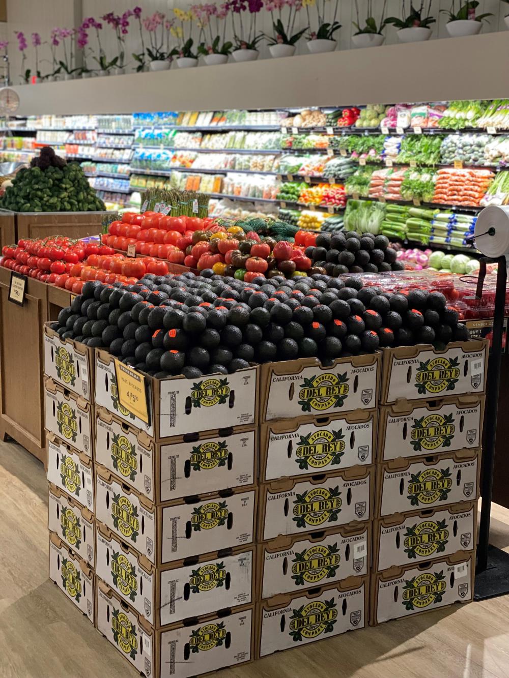 Bulk end cap displays featured California avocados during peak season in Fresh Market stores.