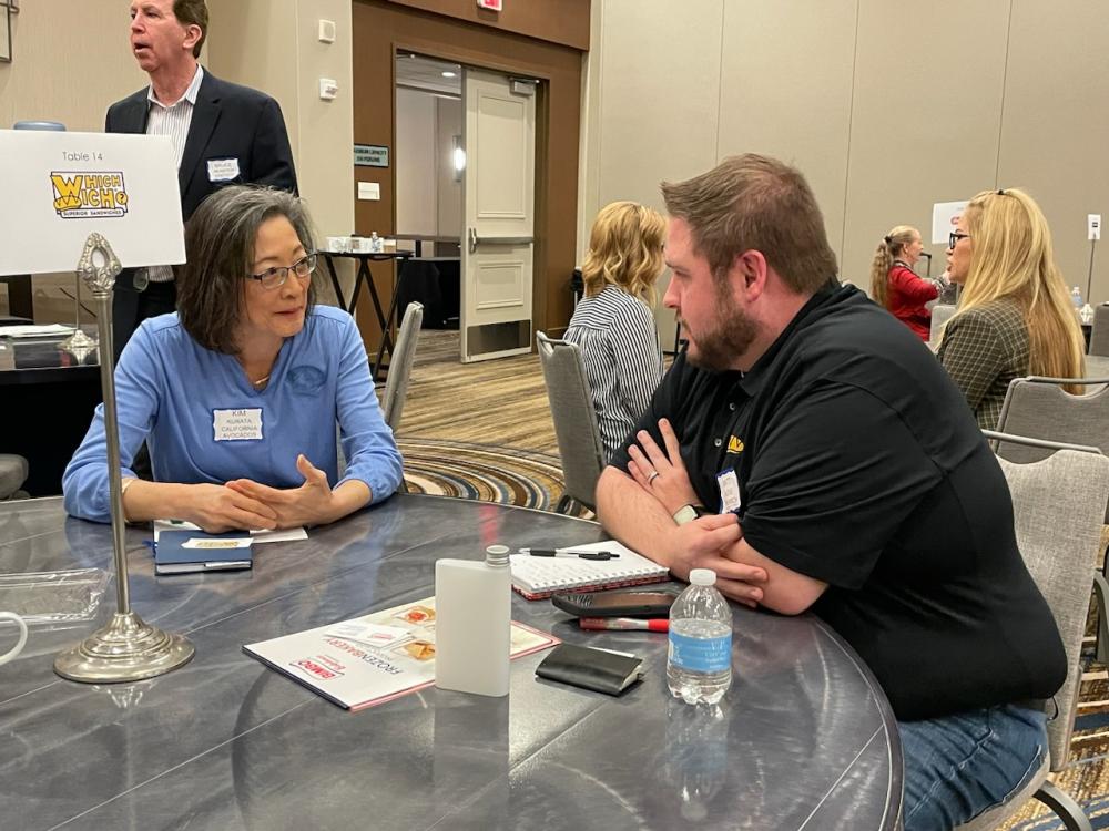 Kim Kurata meeting with Which Wich and discussing the benefits of California avocados on the menu.