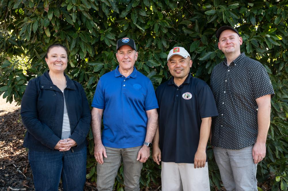 The Commission marketing staff in a California avocado grove