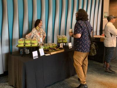 Discussing California avocado menu ideas with a Flavor Experience conference attendee.