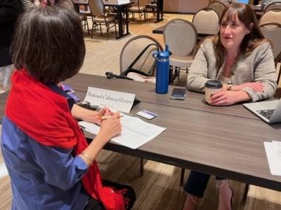 CAC’s Kim Kurata discusses story angles with Amelia Levin, editor of the National Culinary Review.